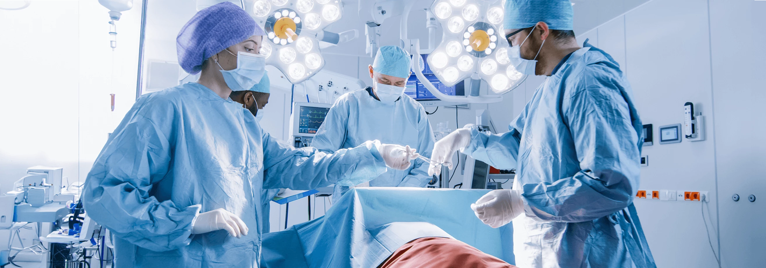 AdobeStock_217273761-Surgery-First-Assisting