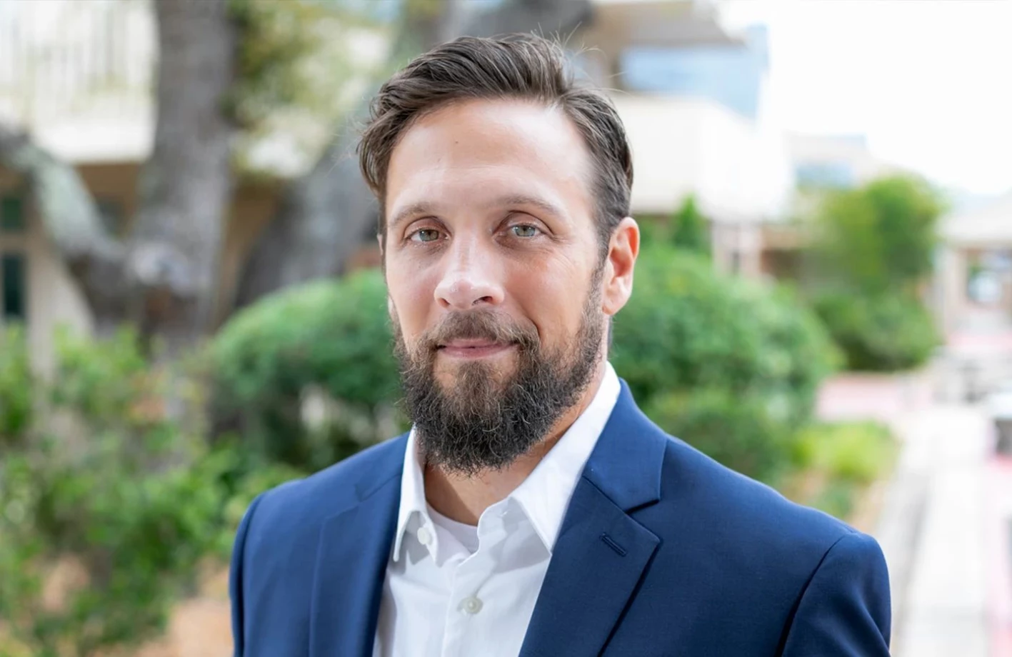 Lance Hargrove, Key Account Manager in a blue suit with a beard at IMS Legal Strategies