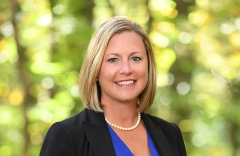 Michelle Sherman, Vice President of Human Resources in black jacket at IMS Legal Strategies