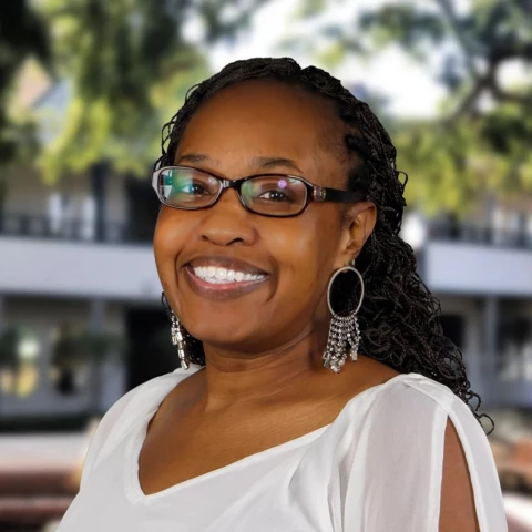 Ricketta Pointer, EdD, Director of Revenue Operations, wearing glasses at IMS Legal Strategies